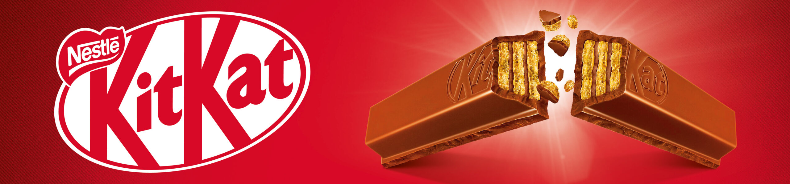 KitKat enseigne fronton devanture de magasin shop PLV Branding Logo barres de chocolat cassées